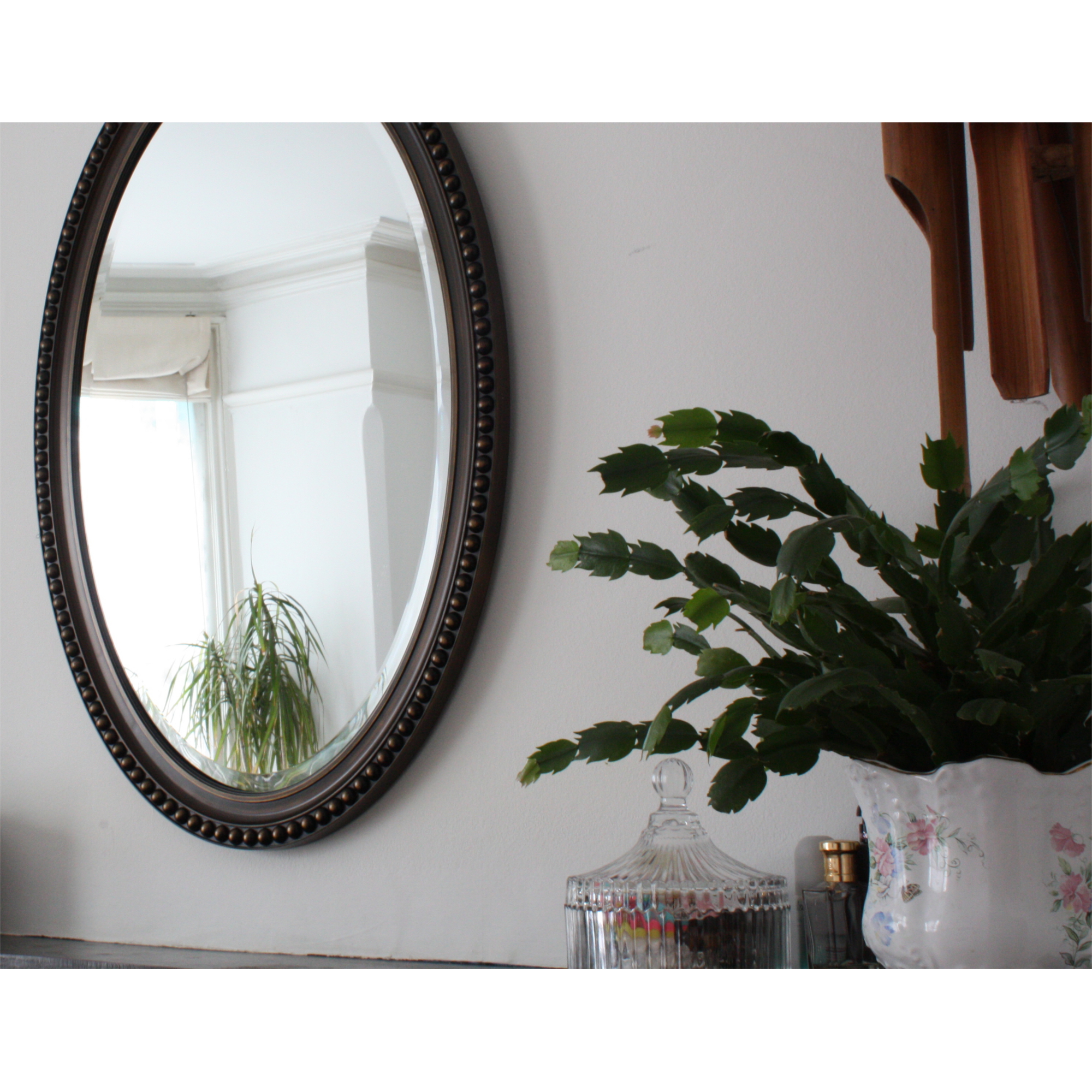 classic oval shaped hallway mirror champagne colouring blendboutique
